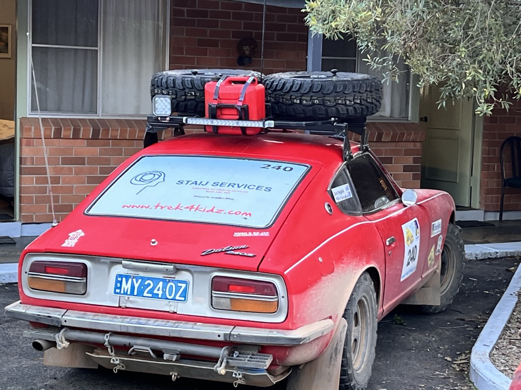 CAR240 in its earlier red Trek4Kidz rally livery